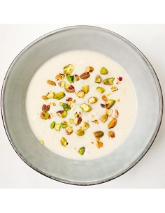 Arroz con leche de coco, cardamomo y pistachos