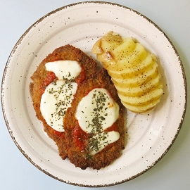 Milanesa napolitana con patata asada